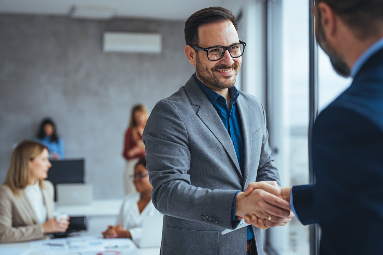 business men shaking hands
