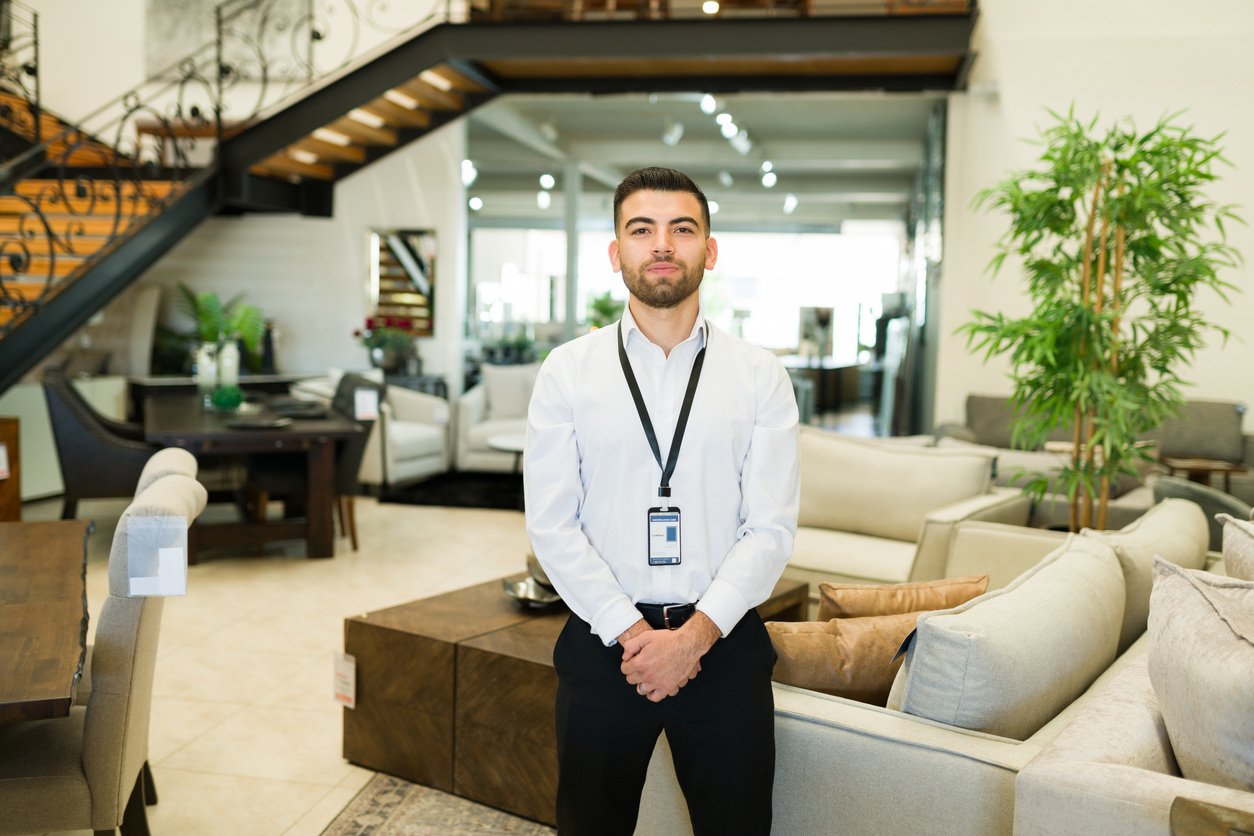 Furniture store owner in his store