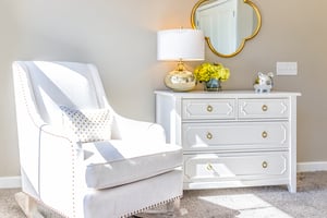 white couch white dresser staged room